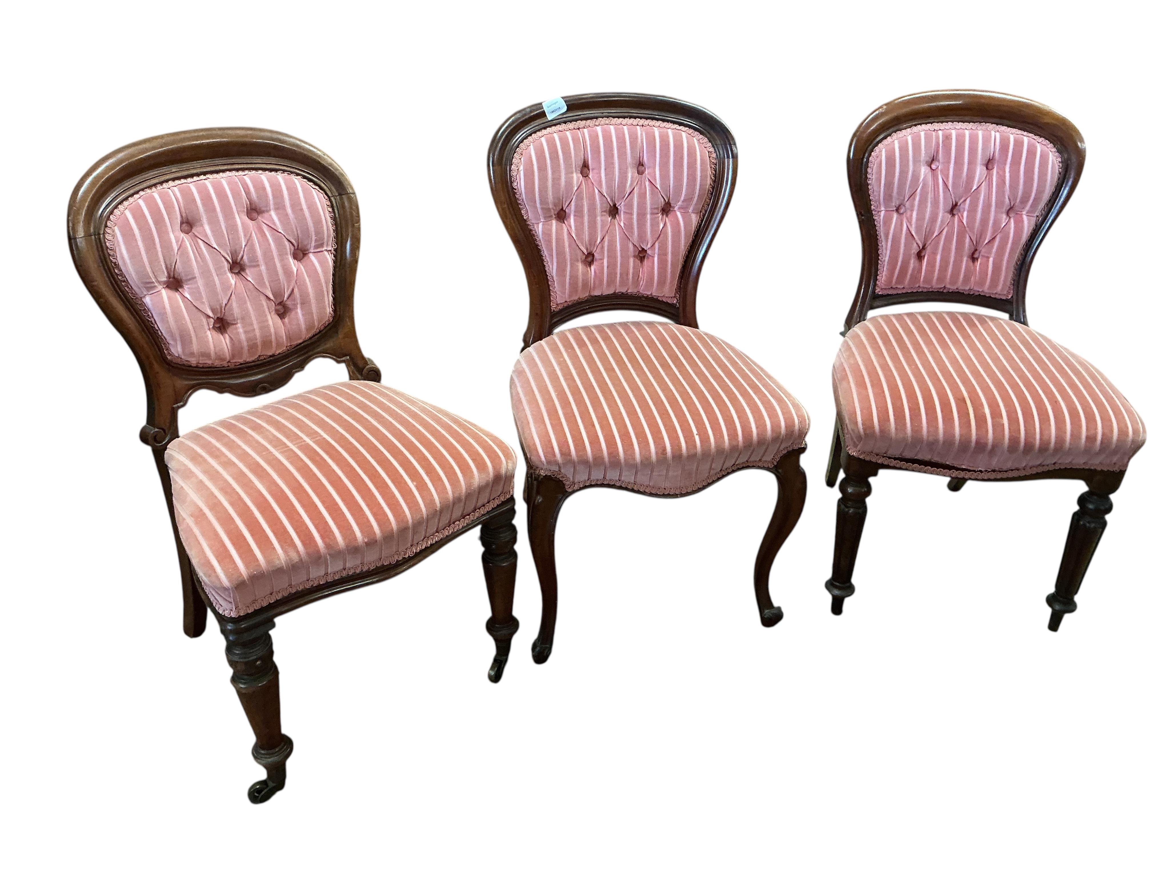 A harlequin set of nine mahogany balloon back dining chairs